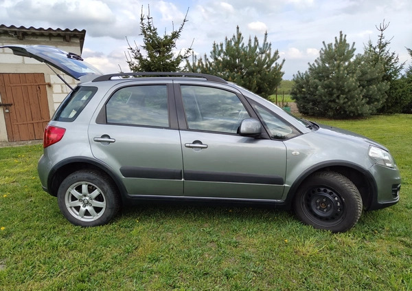 Suzuki SX4 cena 34500 przebieg: 135140, rok produkcji 2013 z Szczecinek małe 211